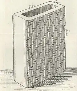 Dessin en noir et blanc d'une canalisation rectangulaire en poterie.