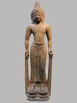 Avalokiteśvara. Style du Phnom Da. Fin VIIe – VIIIe&nbsp;siècle. GrèsH. 171 cm. Musée Guimet