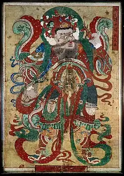 Virūpākṣa. Couleurs sur lin. H. 301 x L. 207&nbsp;cm. British Museum. Gardien disposé à l'entrée d'un temple bouddhiste
