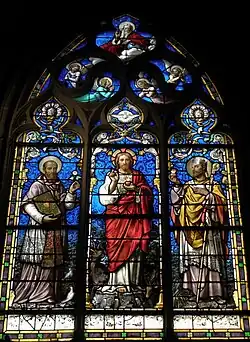 Le Sacré-Cœur entre Saint-François de Sales et Saint-Augustin.