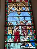 Vitrail du baptême de Jésus dans le Jourdain par saint Jean-Baptiste.