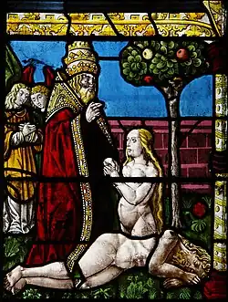 Adam et Ève dans le vitrail de la Création.