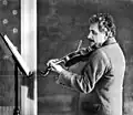 Albert Einstein jouant du violon, photographie publiée en couverture de la revue Zeitbilder, no&nbsp; 21, 22 mai 1927.