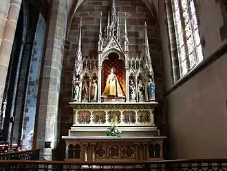 Autel secondaire "Vierge à l'enfant" (XIXe&nbsp;siècle), statue (XVIIIe&nbsp;siècle).