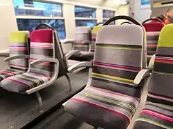 Sièges de la 203A en livrée Carmillon.