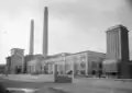 Vue extérieure de l'Abattoir et marché aux bestiaux de la mouche, à Lyon (1928).
