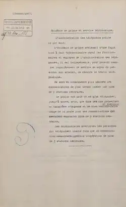 Copie d’une lettre dactylographiée en français, portant en haut à gauche un tampon en allemand, avec une date et un numéro.